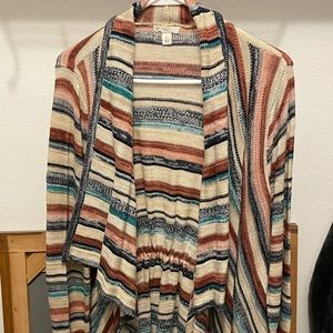 Red, tan and blue striped sweater. Size large